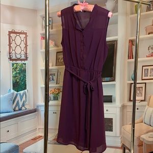 Maroon sleeveless dress with elastic waist/tie.